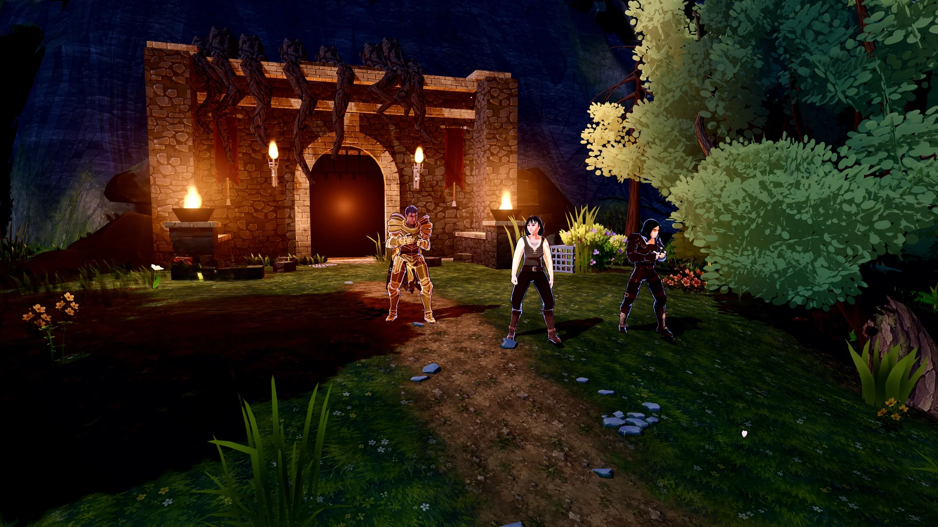 Travellers stand outside a torchlit building at night.