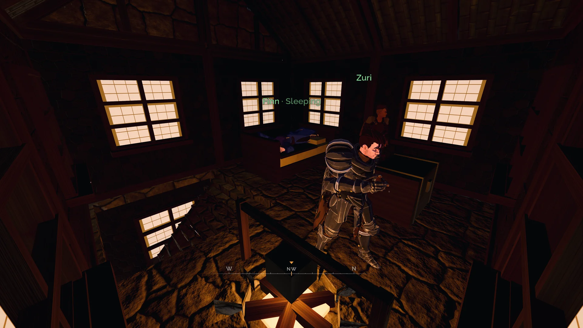 Players rest beside a fire inside a timber home.